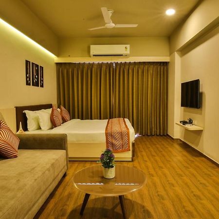 The Weekend Address Hotel Surat Exterior photo