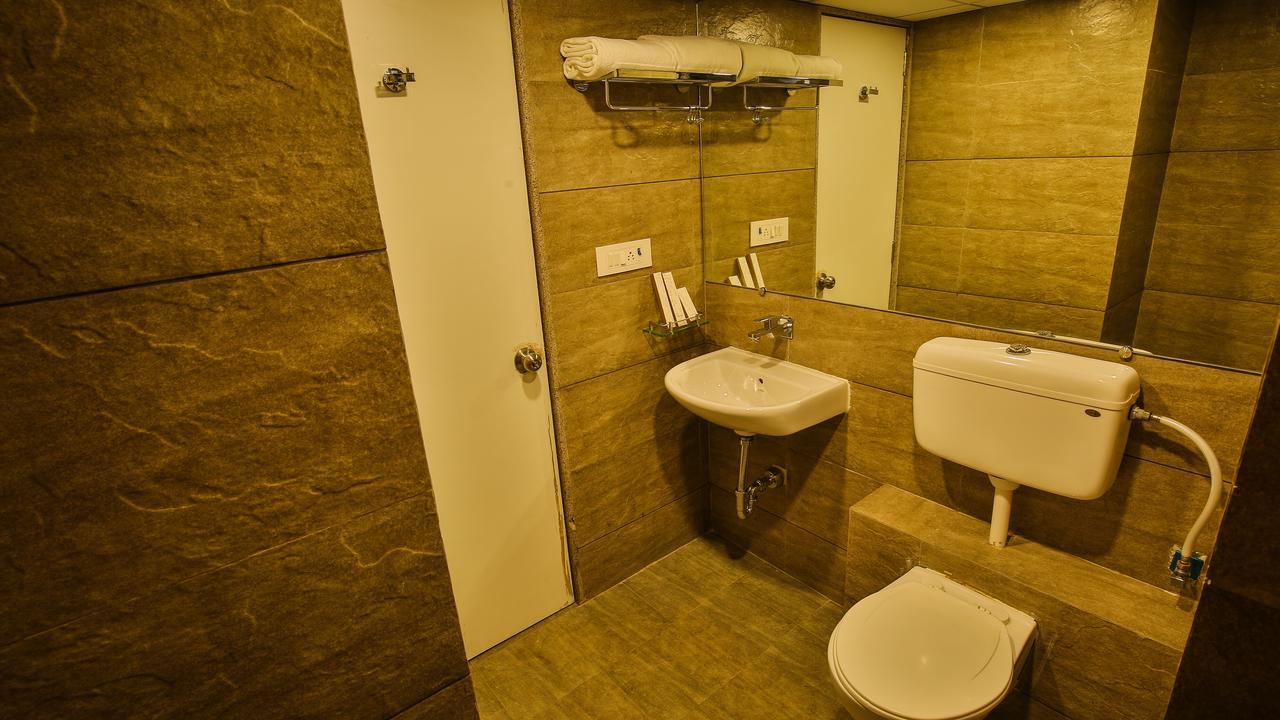 The Weekend Address Hotel Surat Exterior photo
