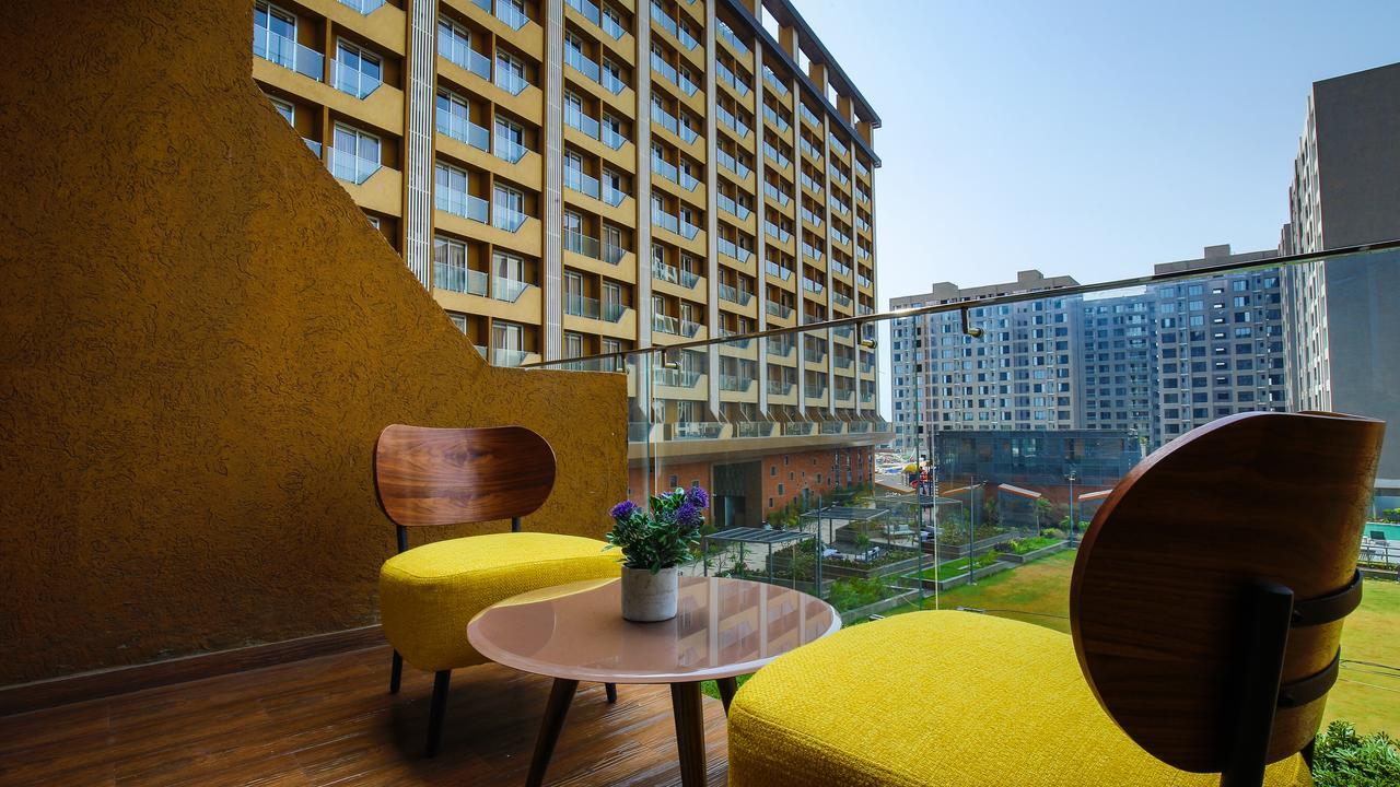 The Weekend Address Hotel Surat Exterior photo